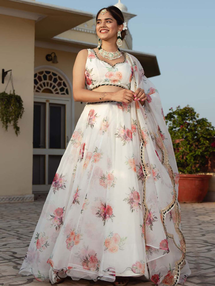  Elegant white color lehenga with delicate floral digital print and beautiful embroidery