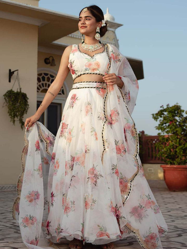 White organza lehenga with digital floral print and intricate embroidery work