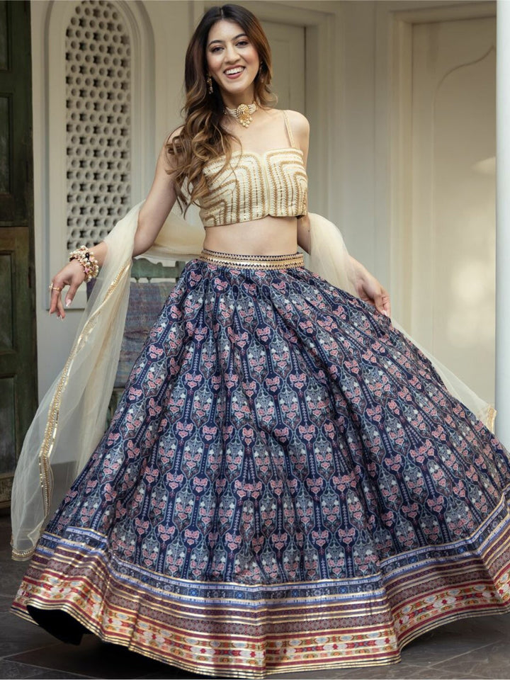 A stunning blue color organza floral digital print lehenga with intricate embroidery work