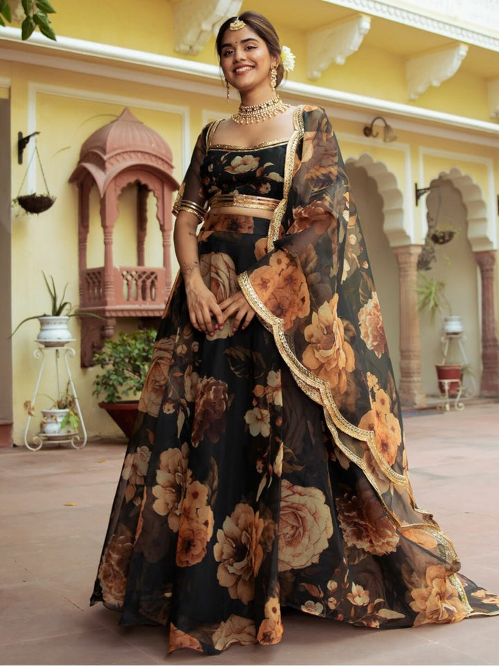 Black color organza lehenga with digital print, pearl, redham and zari embroidery work, and real mirror work blouse - elegant and luxurious traditional Indian outfit