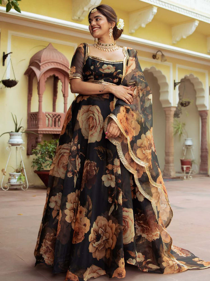 Black organza lehenga with digital print, pearl, redham and zari embroidery, and real mirror work blouse - elegant and sophisticated Indian ethnic attire