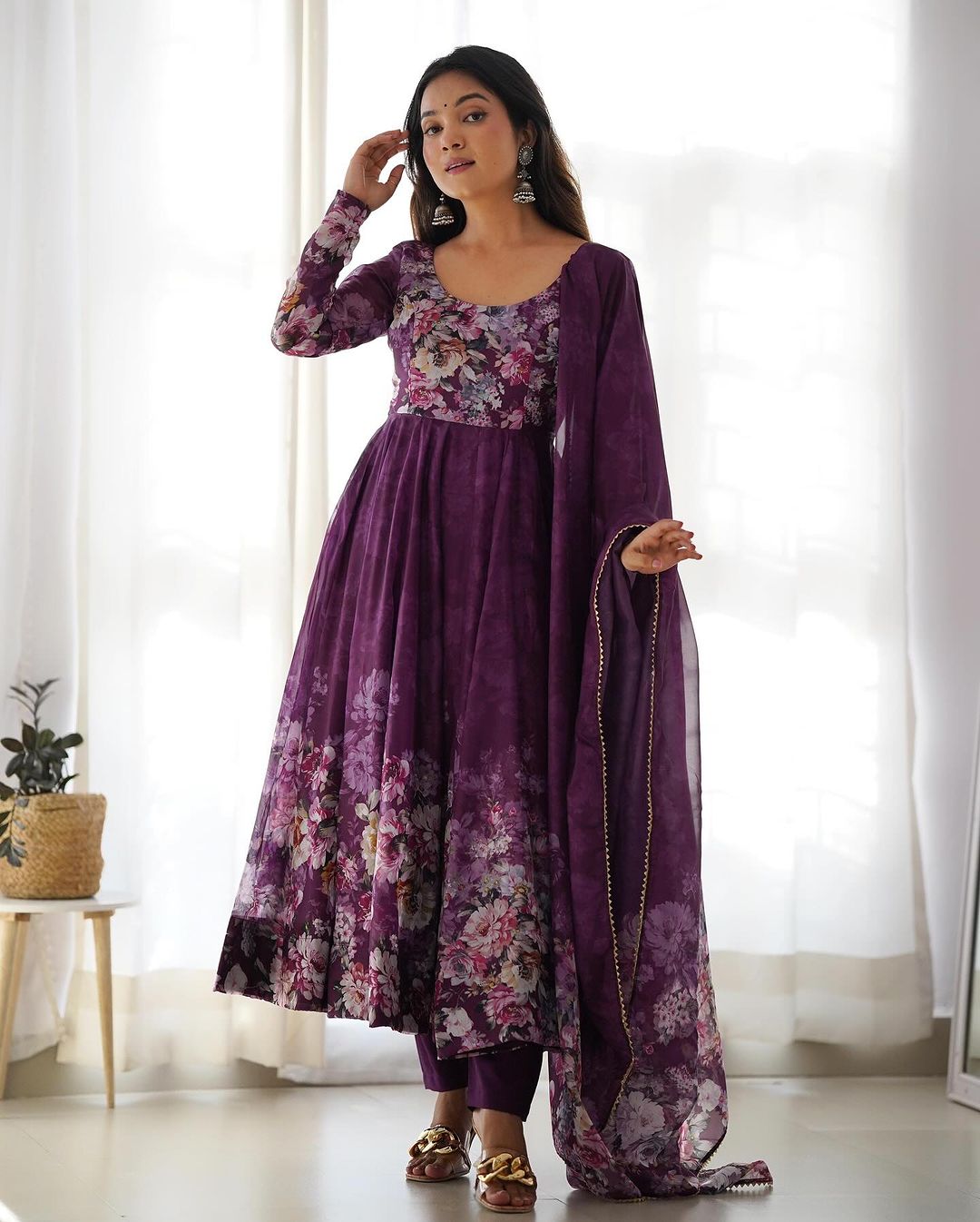  Gorgeous three-piece Anarkali suit in wine color with floral print by Qivii 