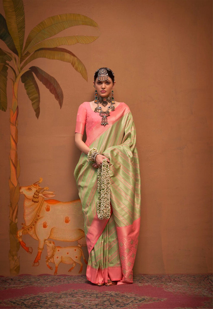 Festive Peach and Green Silk Blend Woven Saree