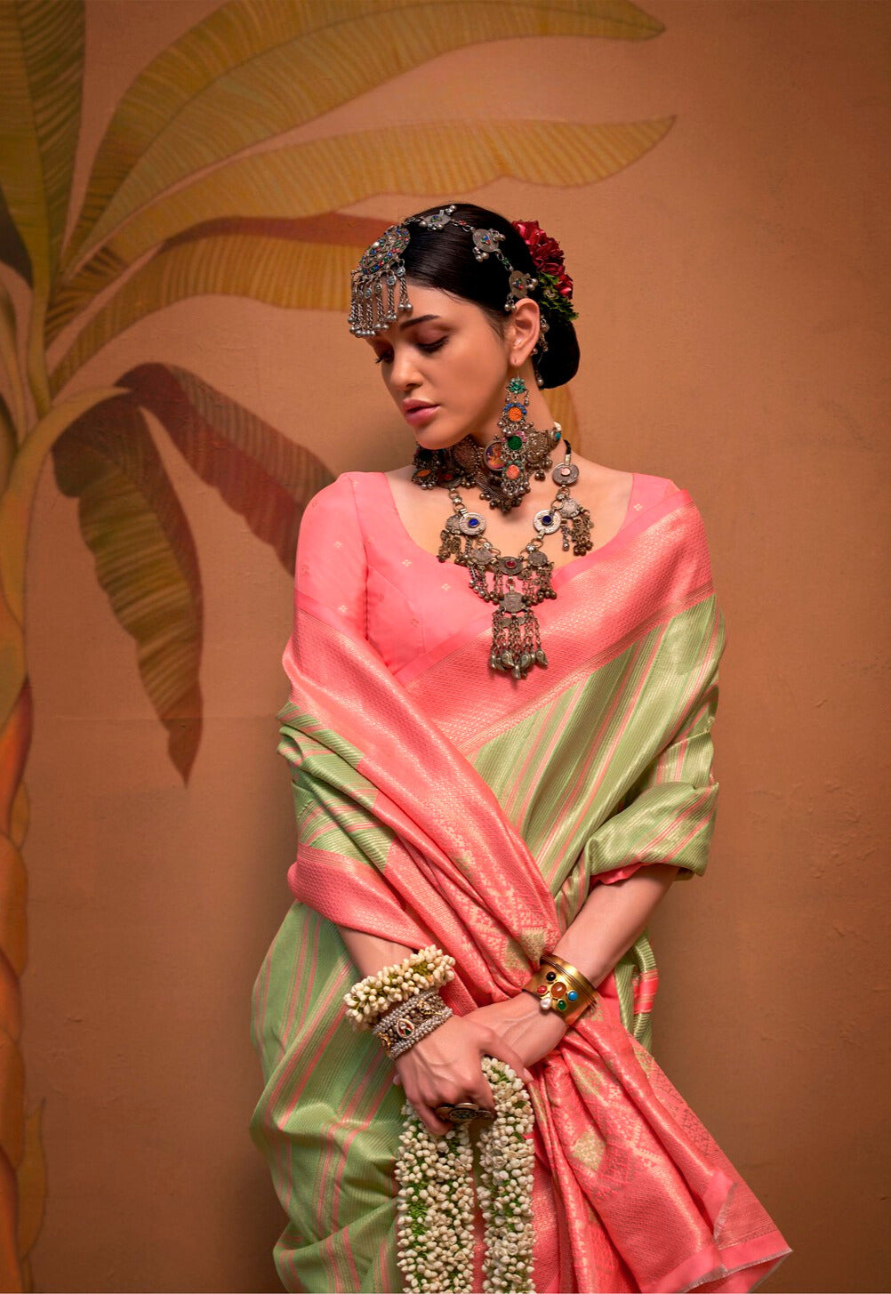 Festive Peach and Green Silk Blend Woven Saree