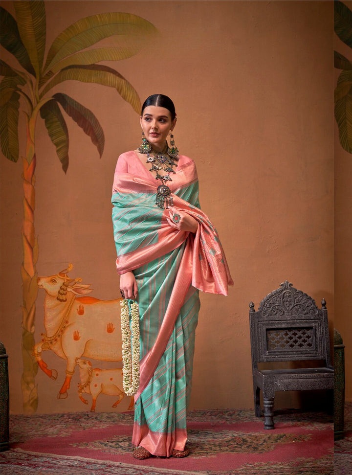 Festive Peach and Pista Silk Blend Woven Saree