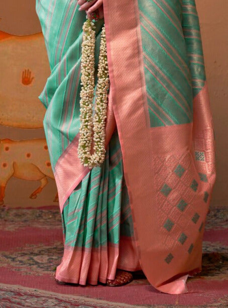 Festive Peach and Pista Silk Blend Woven Saree