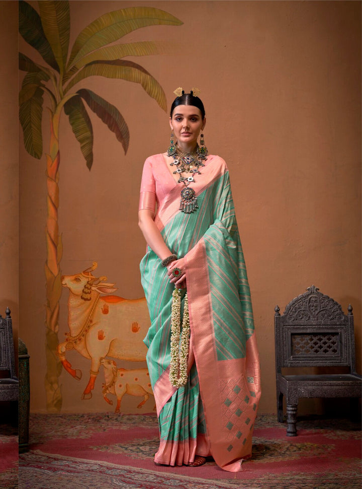 Festive Peach and Pista Silk Blend Woven Saree