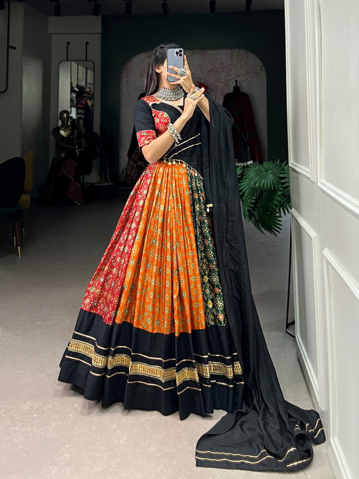 BLACK & ORANGE Dola Silk And Pure Cotton Foil Print With Plain And Sequins Lace Lehenga