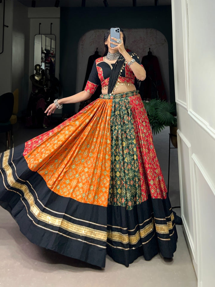 BLACK & ORANGE Dola Silk And Pure Cotton Foil Print With Plain And Sequins Lace Lehenga