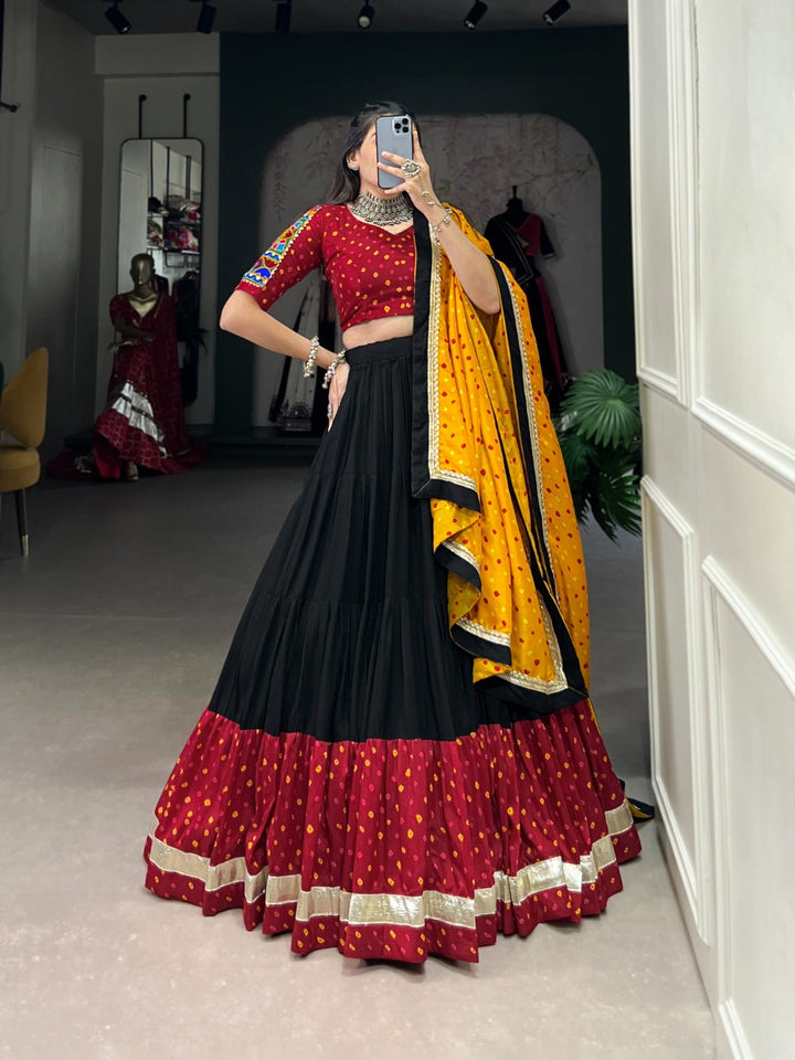 Black Color Pure Rayon And Dola Silk Plain And Bandhej Print With Embossed Design Gota Lace Touch Up