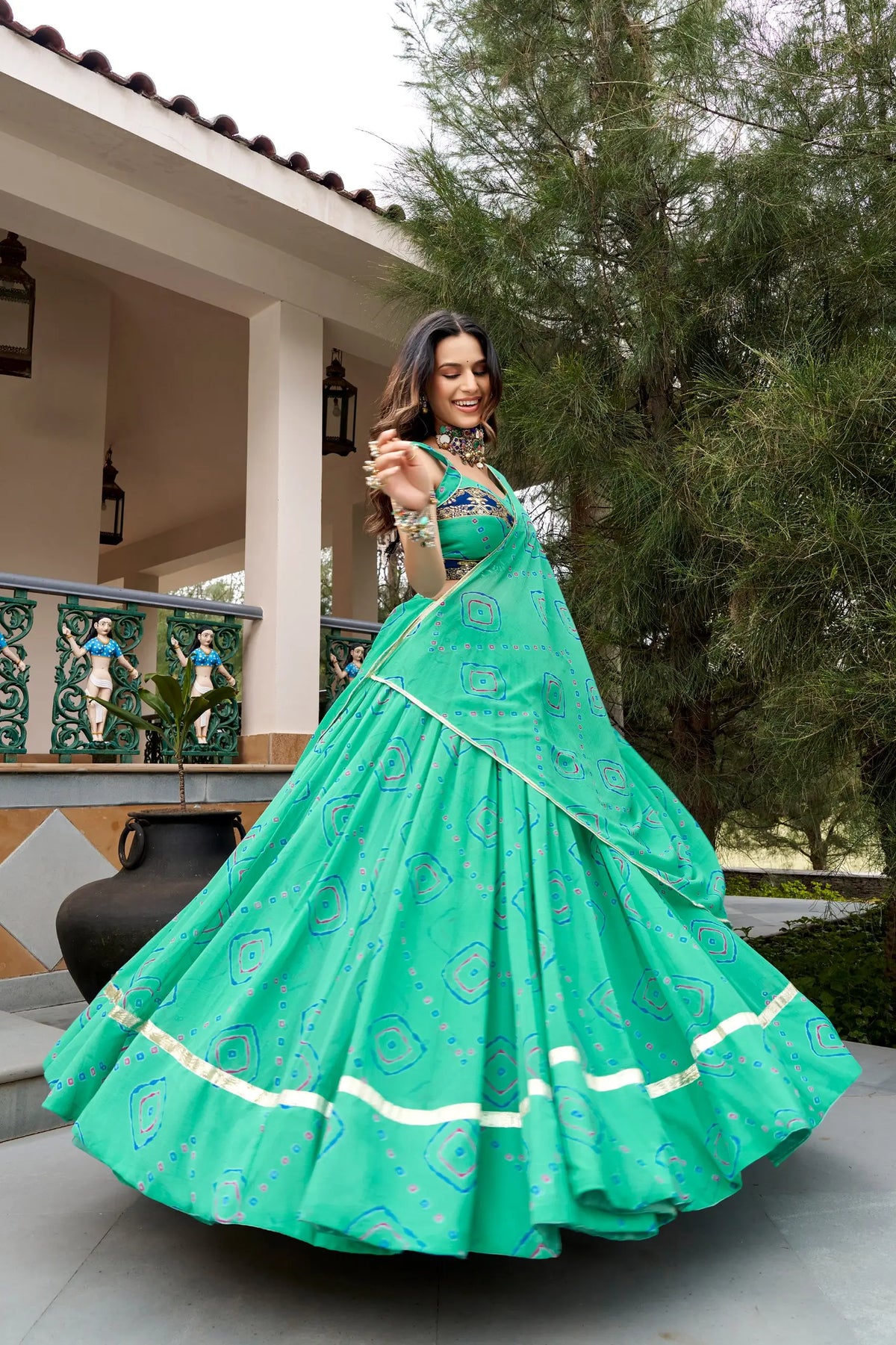 8 Meter Flair | Aqua Green Navratri Lehenga With Bandhej Print & Gota Patti