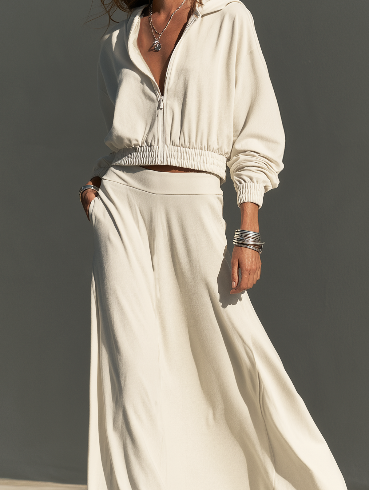 Women's Casual Two-Piece Set Featuring An Off-White Long-Sleeved Sweatshirt-Style Jacket And A Skirt