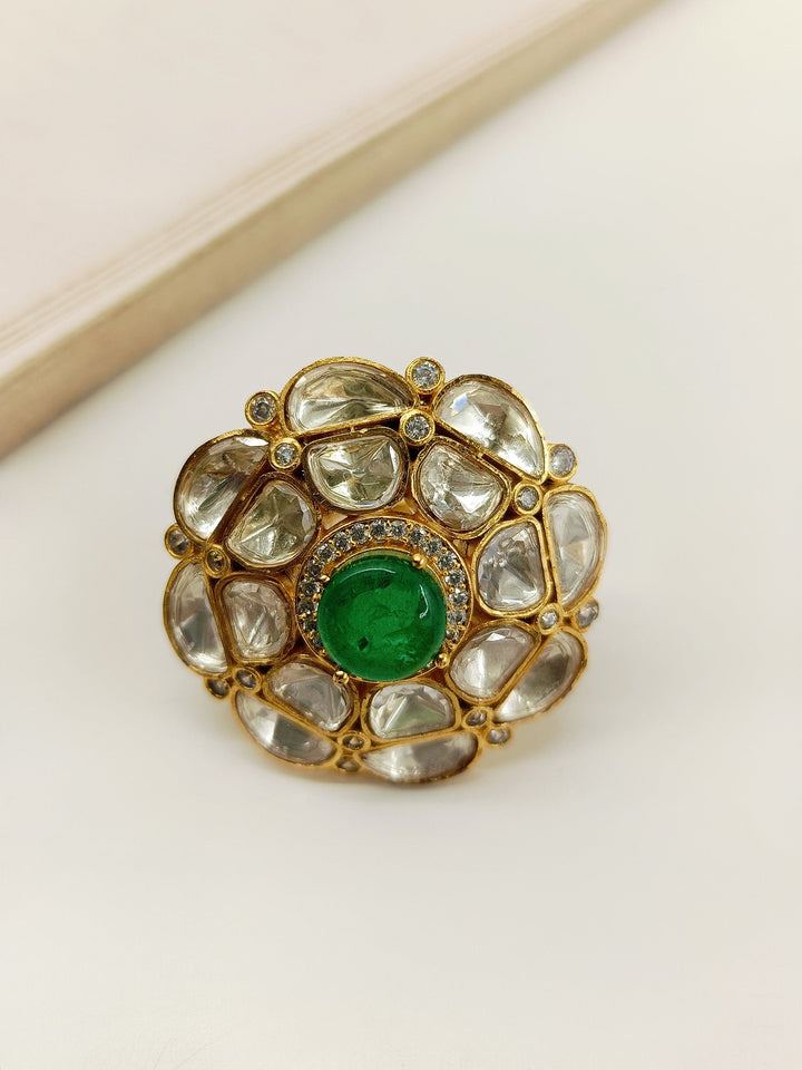 Beautiful emerald Kundan finger ring with intricate gold detailing and stunning craftsmanship