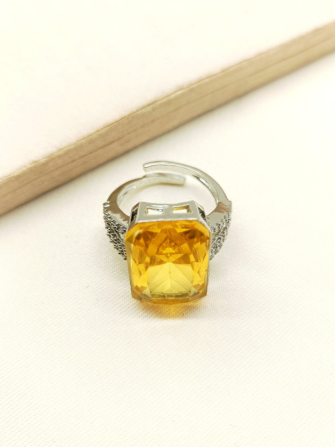 Close-up of elegant Lucy Yellow American Diamond Finger Ring