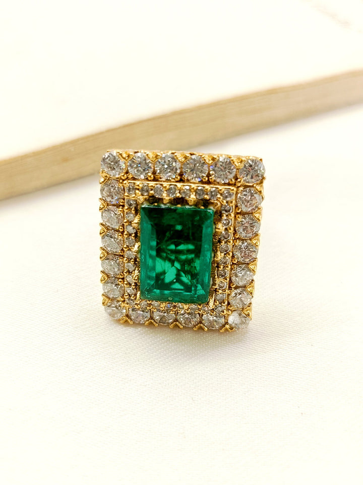 Harsha Emerald American Diamond Finger Ring in 18k gold with intricate details and elegant design