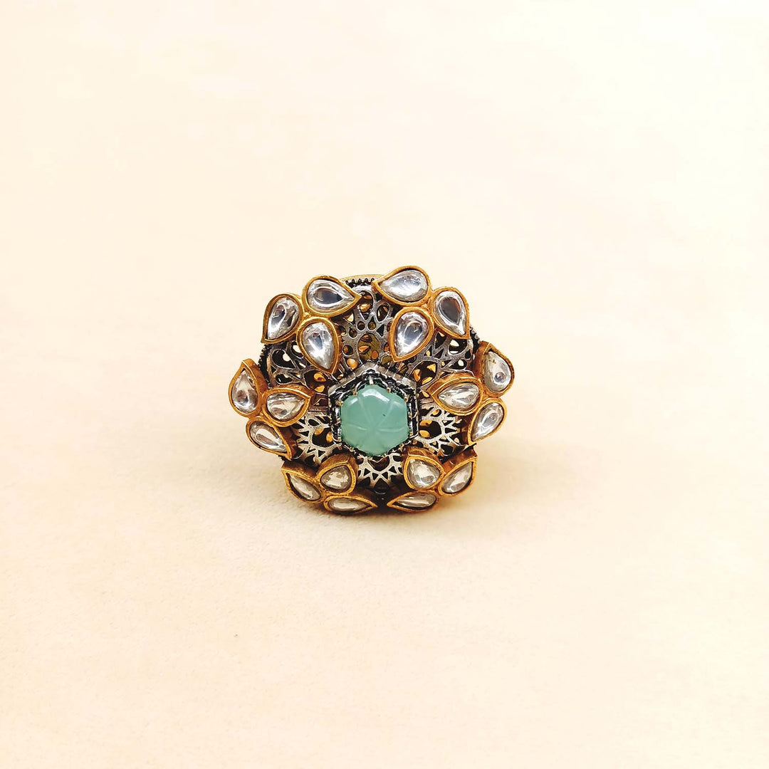 Side view of Hasina Mint Green Stone Gold Plated Boutique Ring with gold plating and mint green stone, perfect for special occasions