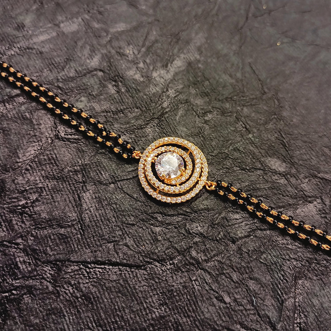 Sarla Diamond Piece With Black Beads Gold Plated Hand Mangal sutra