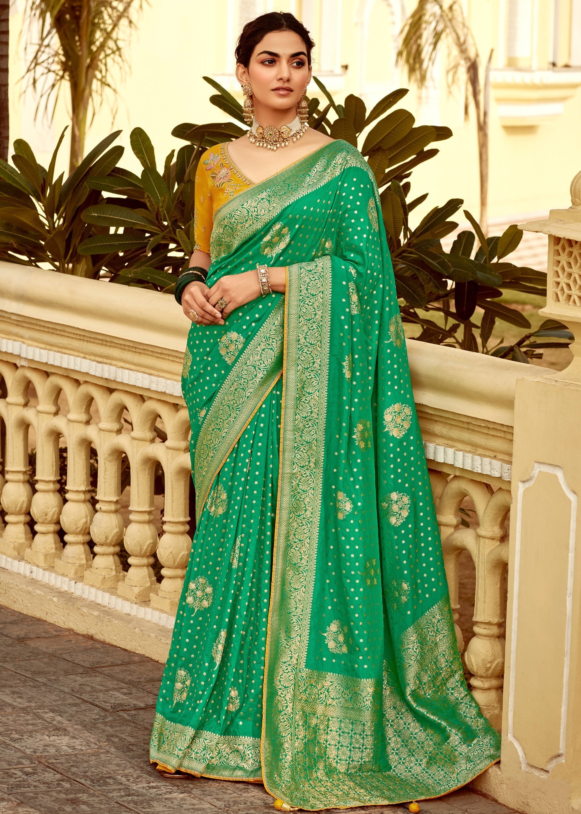 Emerald Green Dola Silk Saree Embellished With Weaving Work And Heavy Embroidered Blouse - qivii