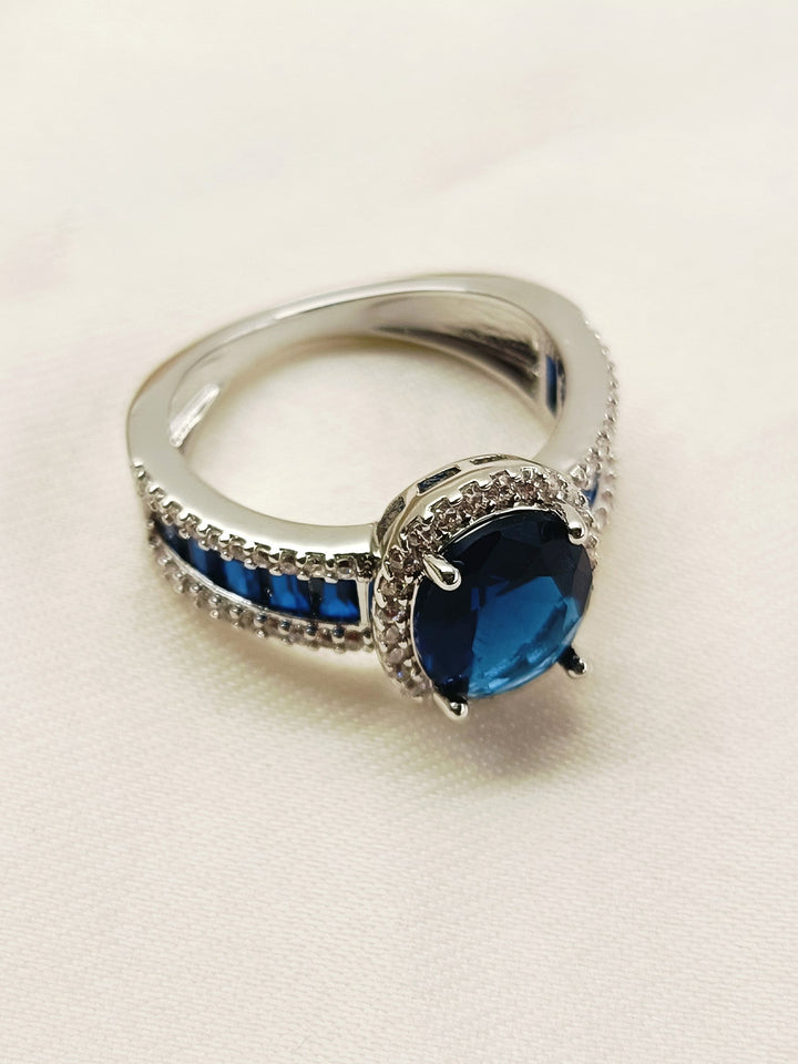 Beautiful navy blue American diamond finger ring with intricate detailing and elegant design