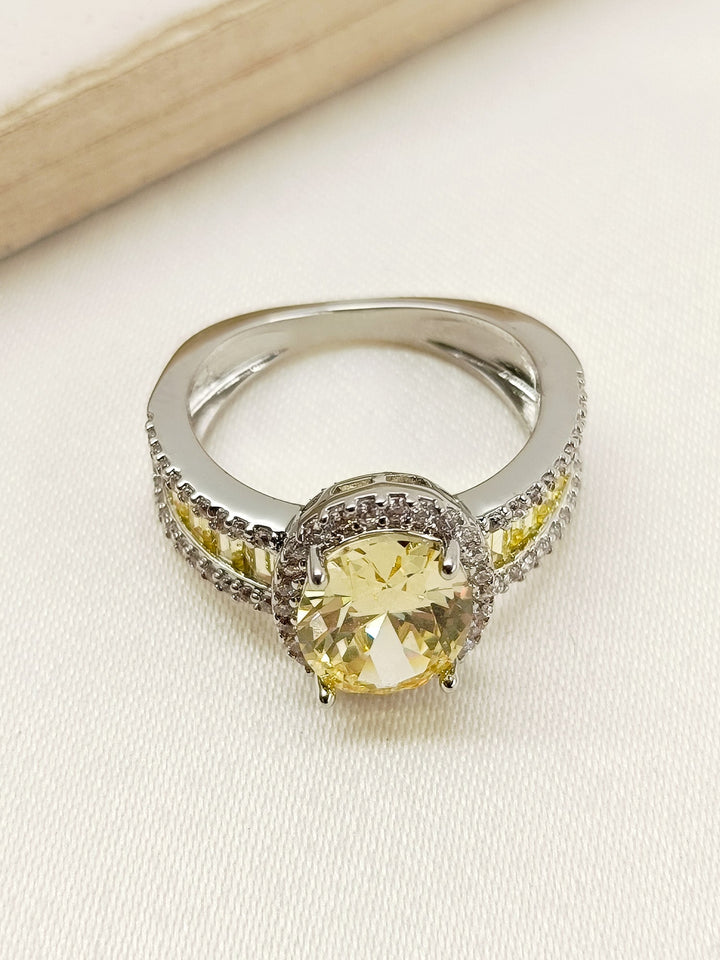 Aasha Yellow American Diamond Finger Ring with intricate floral design and sparkling gemstones