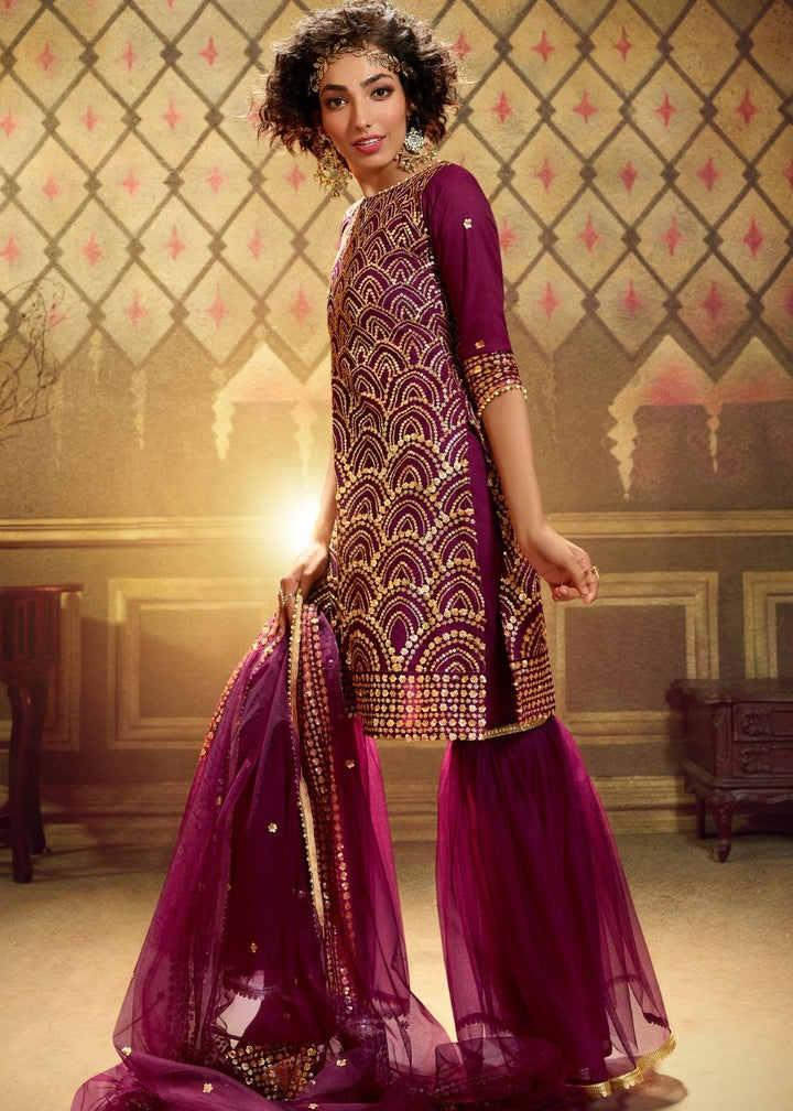 Wine Designer Soft Net Sharara Suit with overall Sequins work