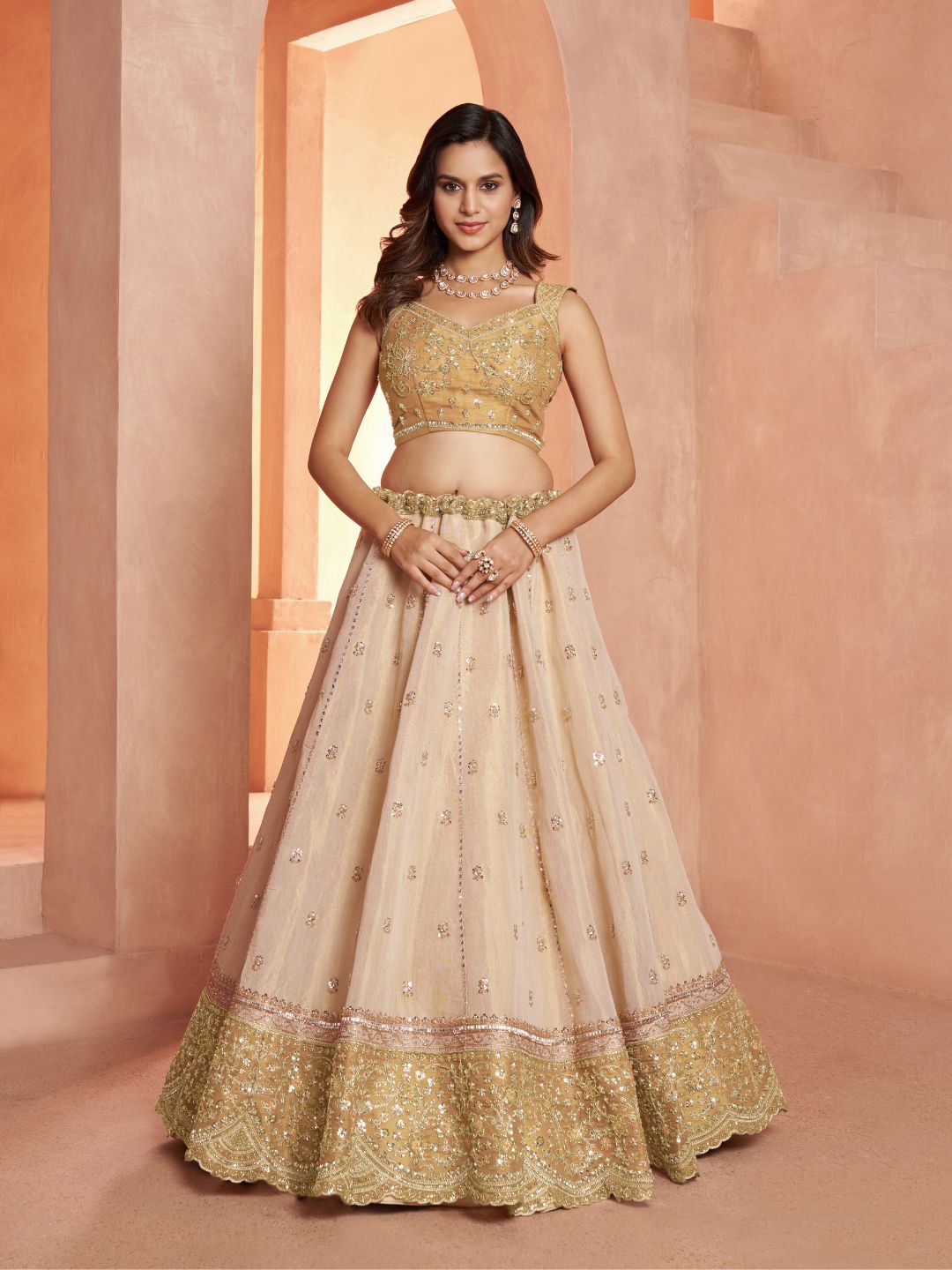 Graceful Gold Lehenga Featuring Handcrafted Embroidery