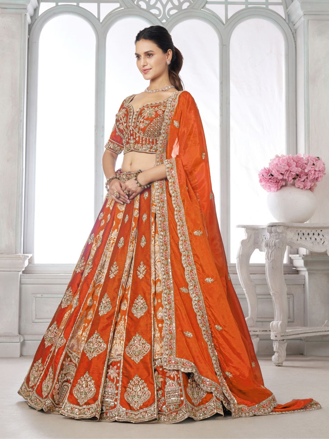 Elegant Rust Lehenga Featuring Rich Raw Silk and Artisan Craftsmanship