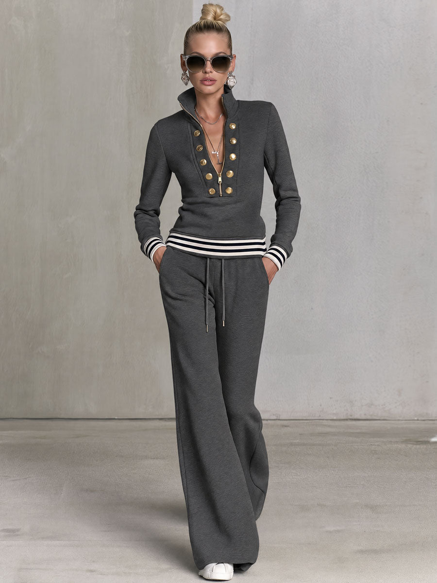Grey sporty women's sweatshirt and wide-leg pants set by Oyrosy Clothing, featuring a half-zip top and comfortable fit.