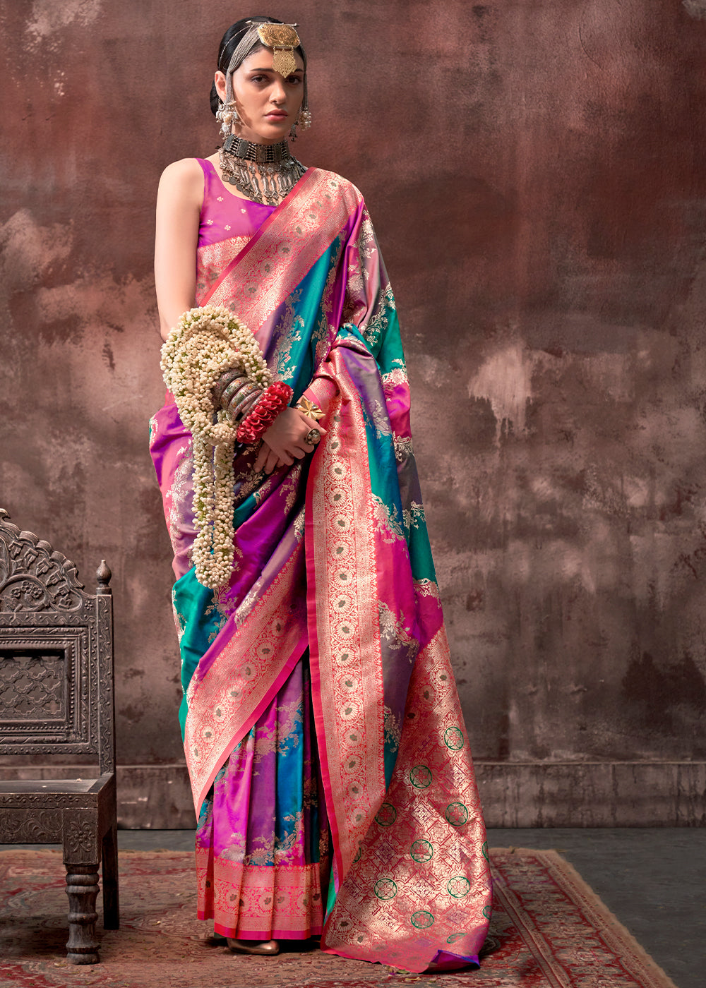 Blue and Pink Rangkaat Handloom Silk Saree with Floral Motifs and Gold Border