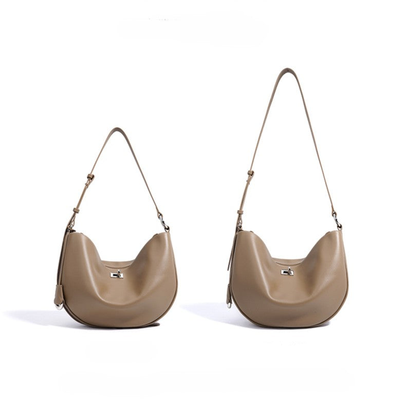 Women's Hush Rider Bucket — Genuine Leather Saddle Bag with Signature Lock Fastening & Convertible Shoulder Strap