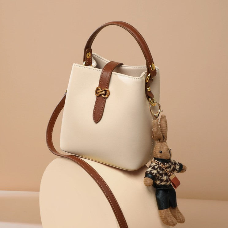 Women’s Bunny Charm Bucket Satchel — Cowhide Leather Convertible with Sculptural Clasp & Signature Whimsy