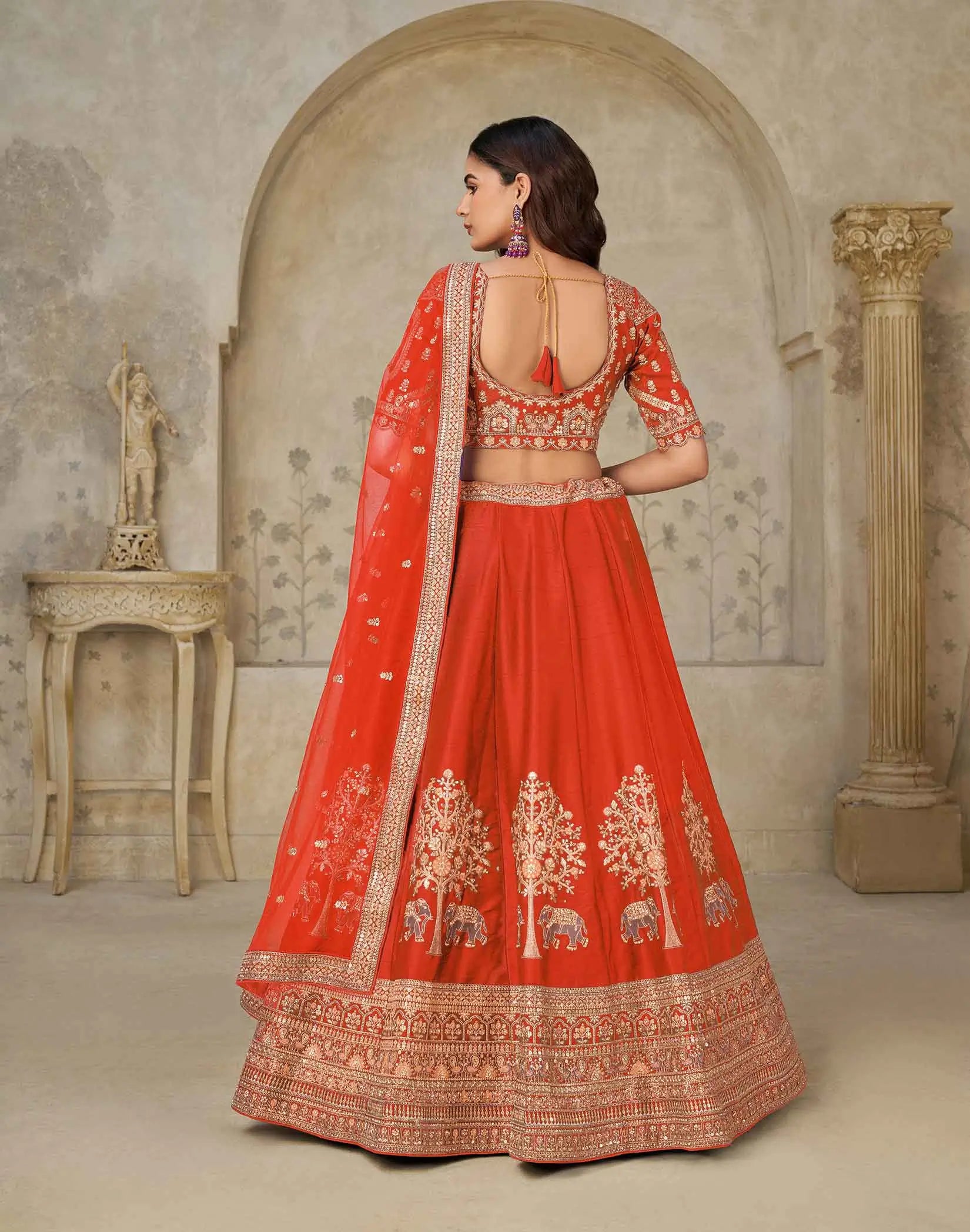 Trendy Rust Wedding Lehenga with Elephant Motifs - qivii