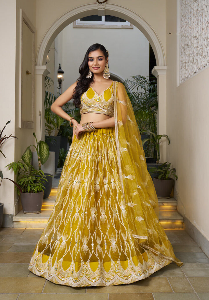 MUSTARD YELLOW BUTTERFLY NET WITH WHITE COTTON THREAD WORK AND SEQUENCE WORK EMBROIDERY