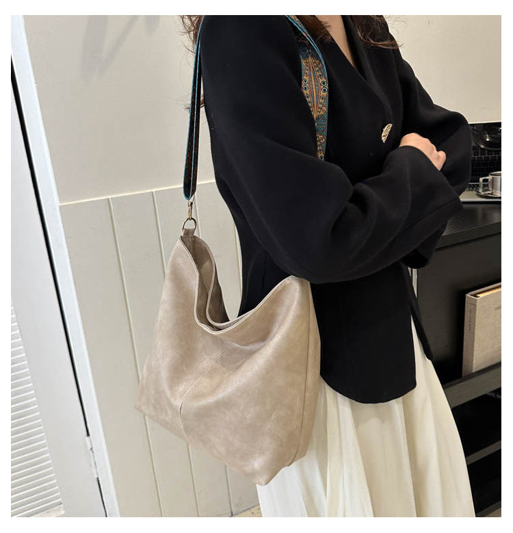 Women's Convertible Crossbody Bucket — Monochrome PU Carryall with Artisan-Embroidered Strap