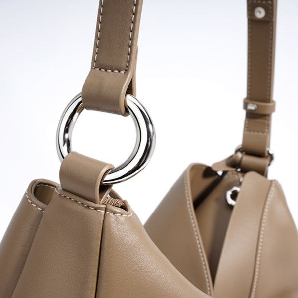 Women's Hush Rider Bucket — Genuine Leather Saddle Bag with Signature Lock Fastening & Convertible Shoulder Strap
