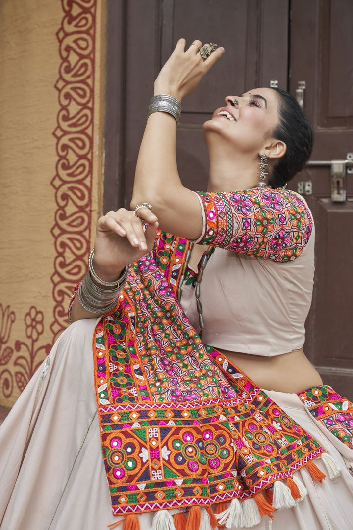 Beige color viscose rayon lehenga with intricate embroidered work detail