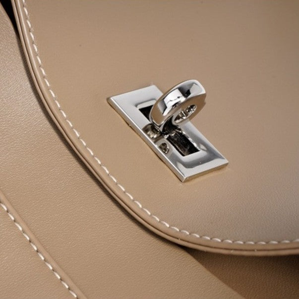 Women's Hush Rider Bucket — Genuine Leather Saddle Bag with Signature Lock Fastening & Convertible Shoulder Strap