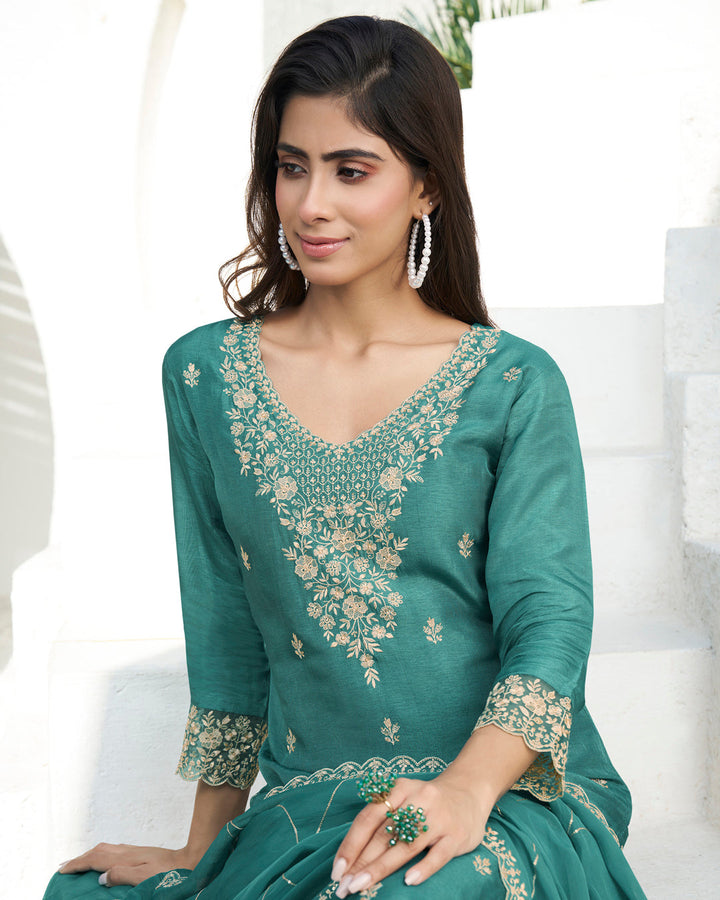 EEmbrace Green Dola Silk Kurta. Paired with Santoon Straight Pants and Organza Dupatta