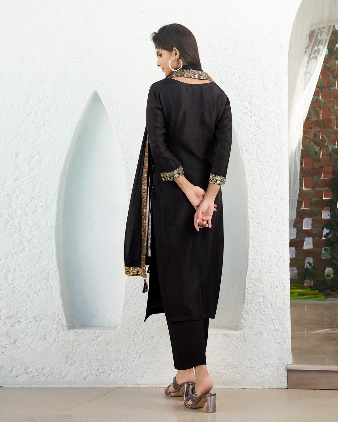 Black Dola Silk Jacquard Kurta . Paired with Santoon Trouser and Chinon Dupatta