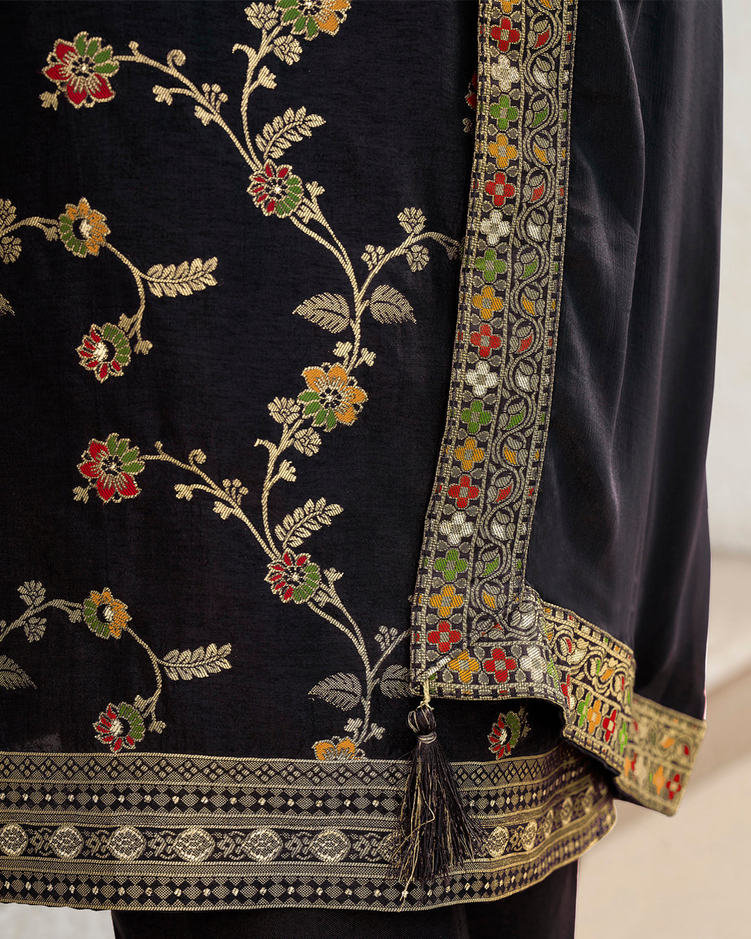 Black Dola Silk Jacquard Kurta . Paired with Santoon Trouser and Chinon Dupatta