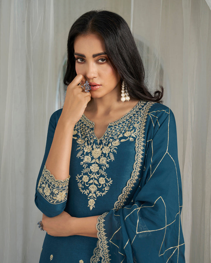 Teal Blue Dola Silk Kurta. Paired with Santoon Straight Pants and Organza Dupatta