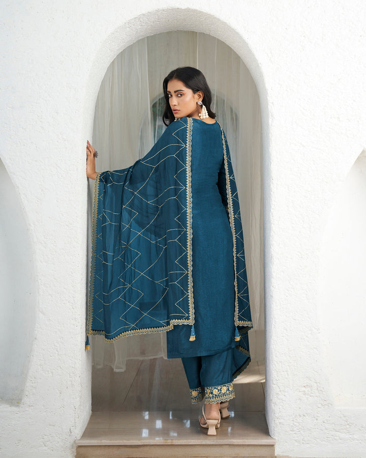 Teal Blue Dola Silk Kurta. Paired with Santoon Straight Pants and Organza Dupatta