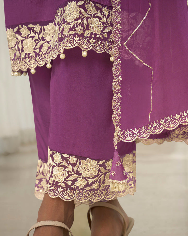 Plum Purple Dola Silk Kurta. Paired with Santoon Straight Pants and Organza Dupatta