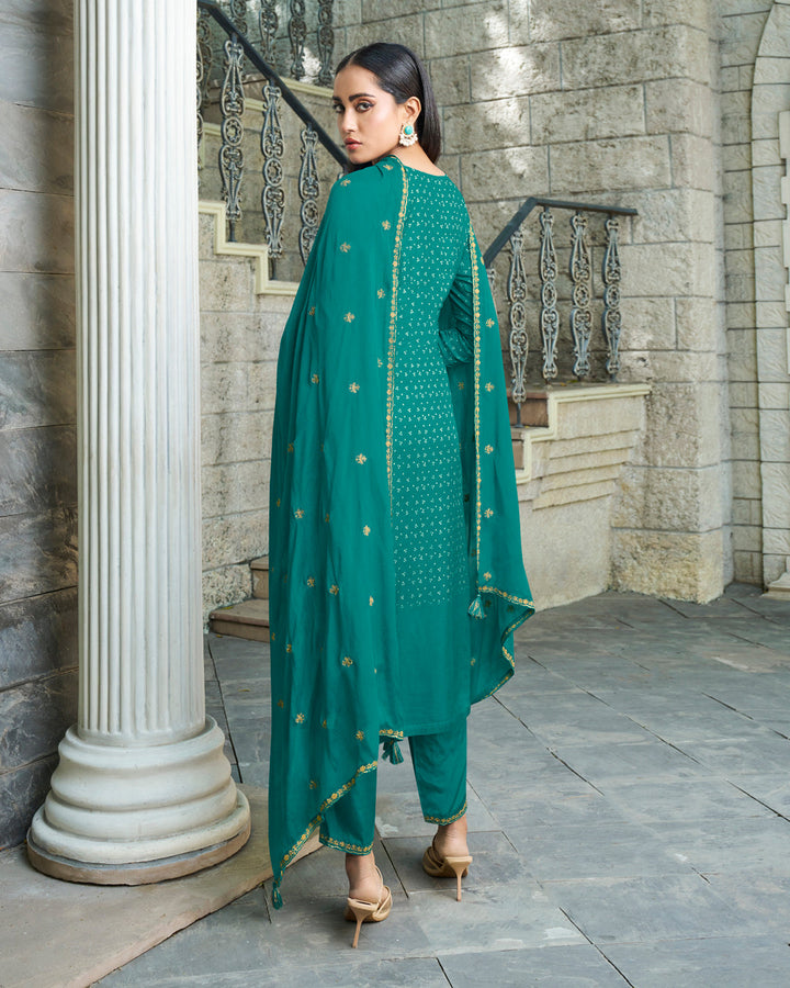 Sea Green Dola Silk Kurta with Bandhni Print & Zari Work. Paired with Santoon Straight Pants and Chinon Dupatta