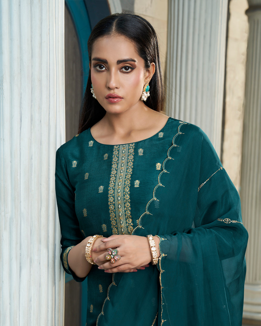 Dark Teal Green Dola Silk Kurta. Paired with Santoon Straight Pants and Organza Dupatta