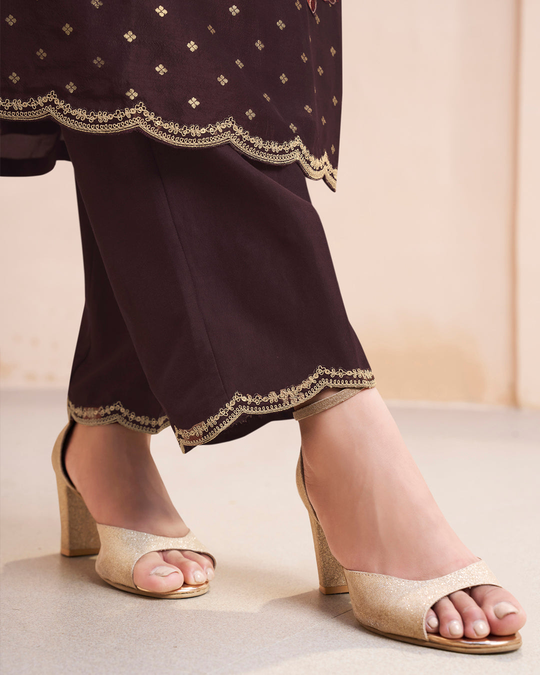 Seal Brown Dola Silk Kurta . Paired with Santoon Straight Pants and Organza Scalloped Dupatta