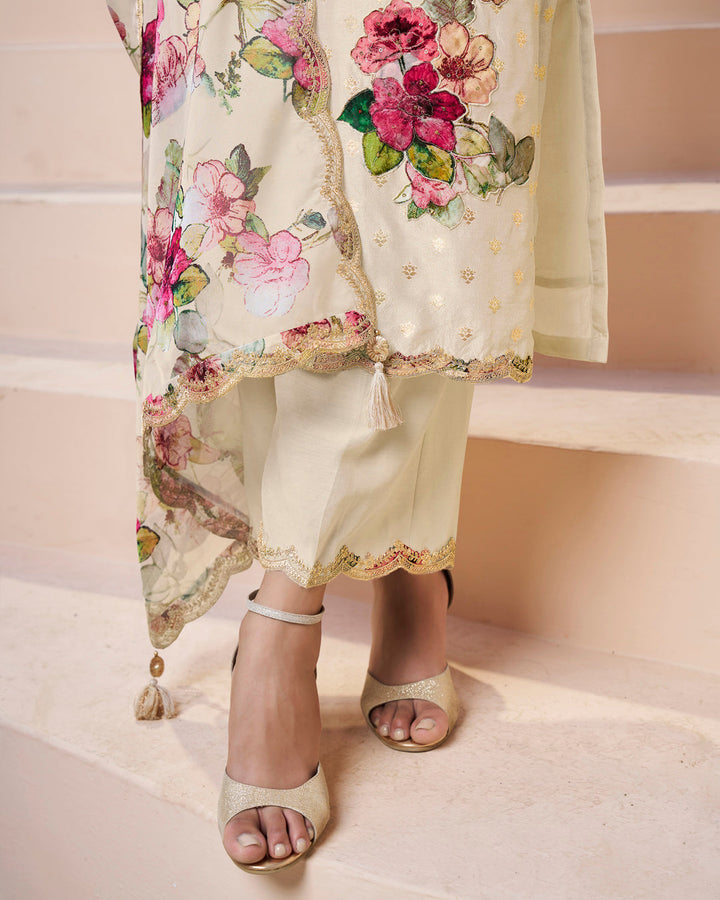 Cream Dola Silk Kurta. Paired with Santoon Straight Pants and Organza Scalloped Dupatta