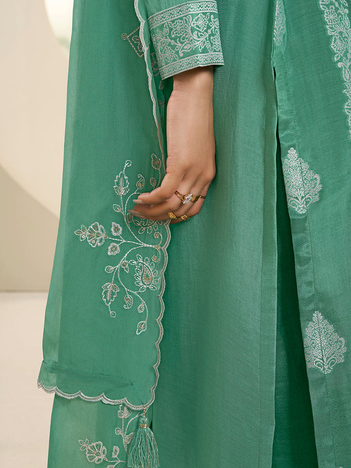 Green Muslin Jacquard Kurta Suit Set with Handcrafted Buttons by Qivii