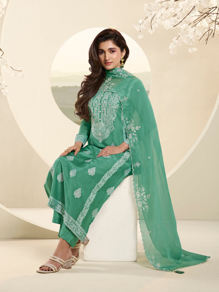 Green Muslin Jacquard Kurta Suit Set with Handcrafted Buttons by Qivii