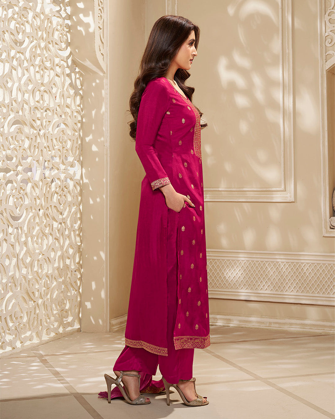 Magenta Pink Dola Silk Kurta . Paired with Santoon Straight Pants and Chinon Floral Printed Dupatta.